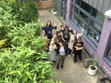 Students from Sheaf Training enjoying their community garden